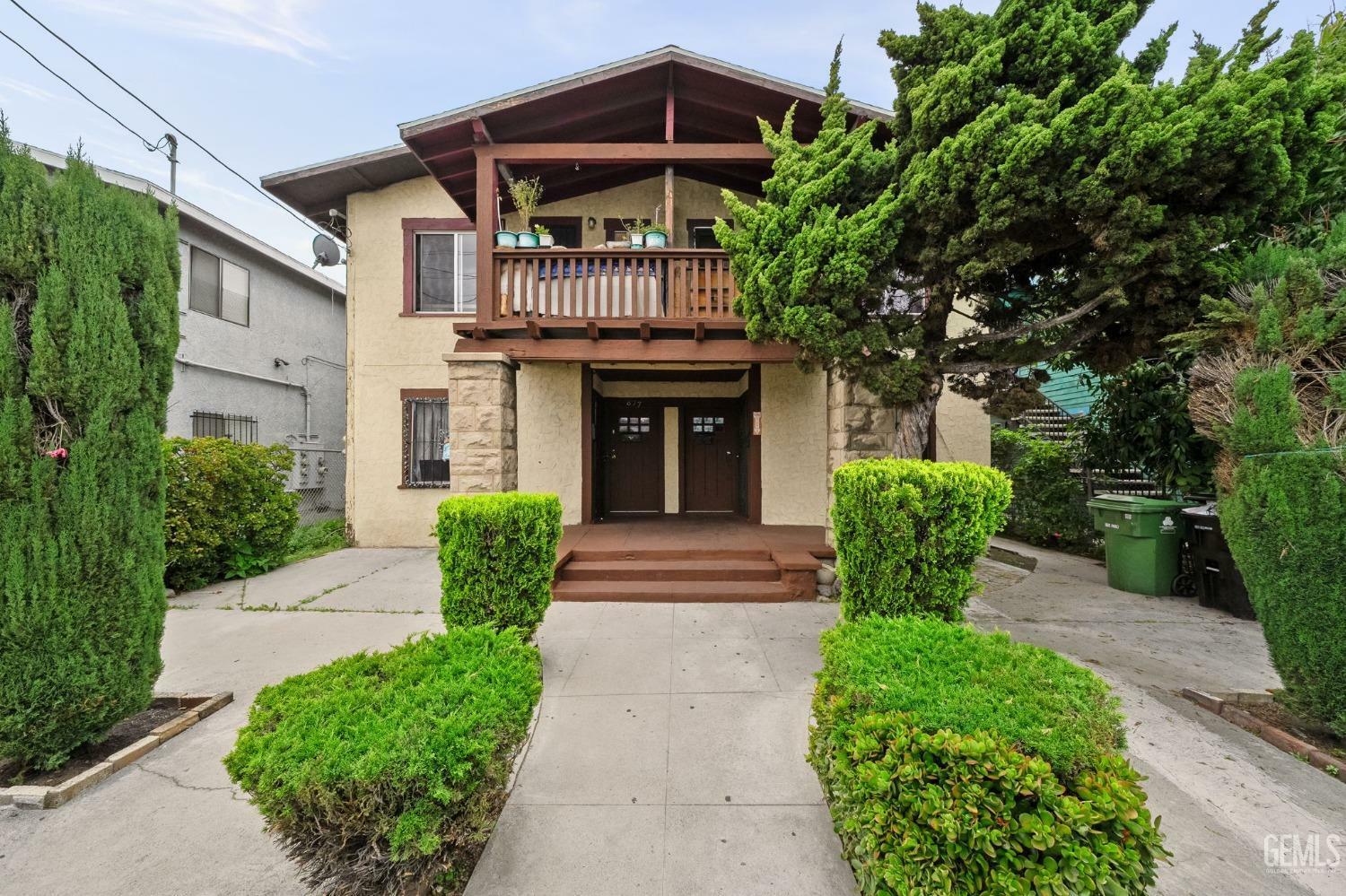 Property Photo:  873 W Vernon Avenue  CA 90037 
