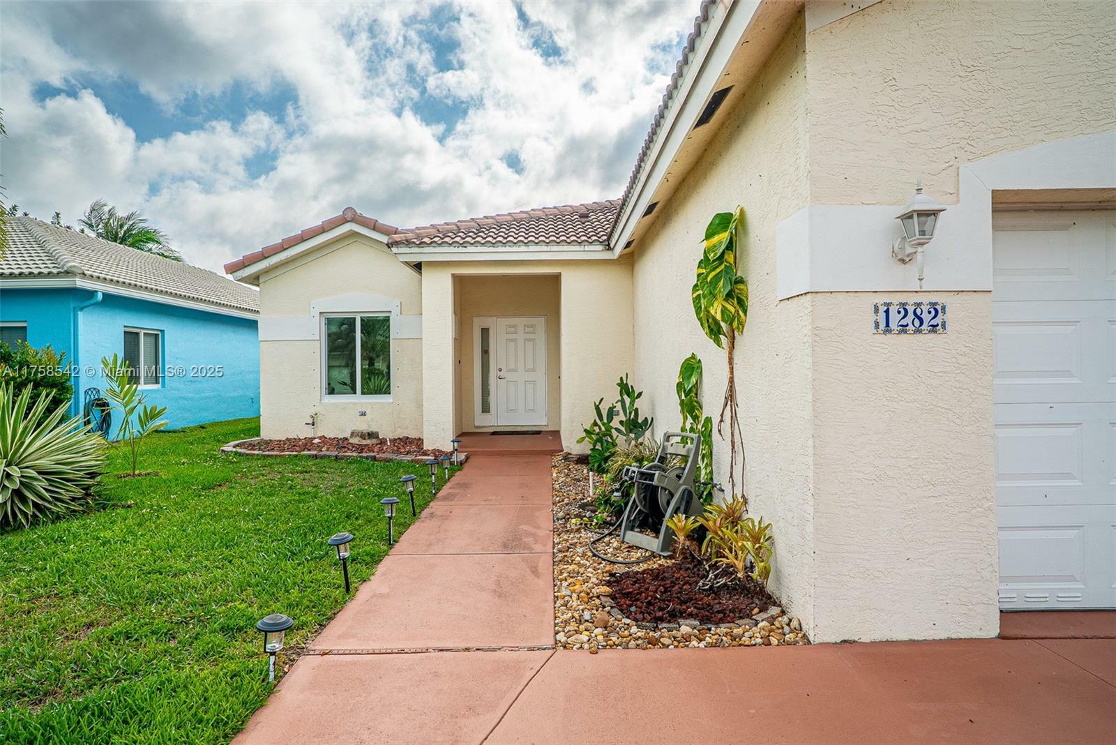 Property Photo: 1282 SW 44th Ter FL 33442