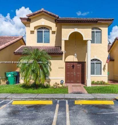 Property Photo:  18871 NW 84th Ct 1002  FL 33015 