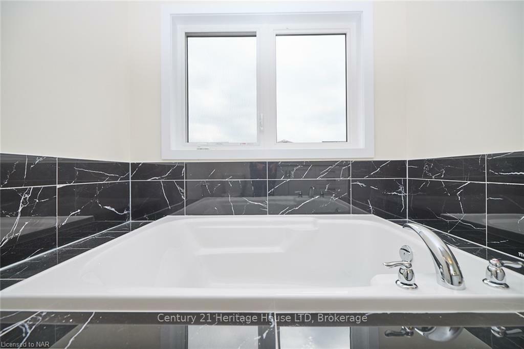 Property Photo: 39 Downriver Dr W ON L3B 5K5