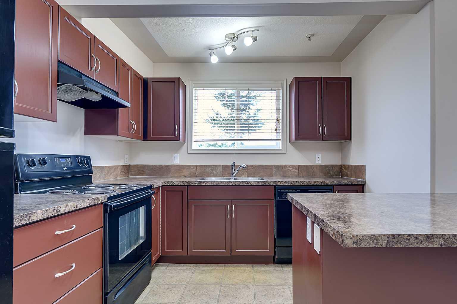 Property Photo: 5601 Kerrywood Drive 307 AB T4N 4X3