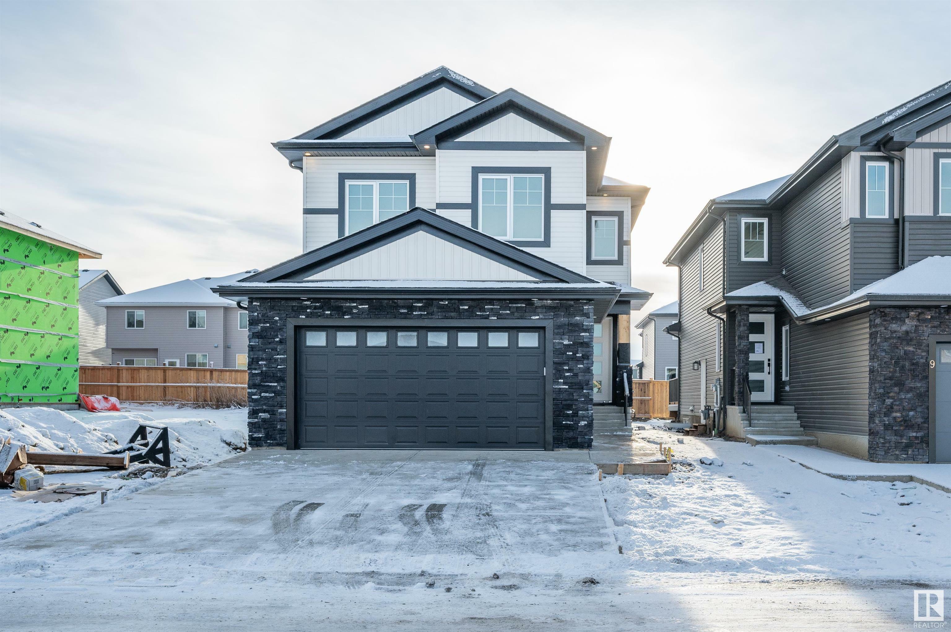 Property Photo: 9 Blackbird Bend AB T8L 2E0