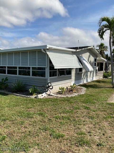 Property Photo: 7127 Ladyfish Drive FL 33956