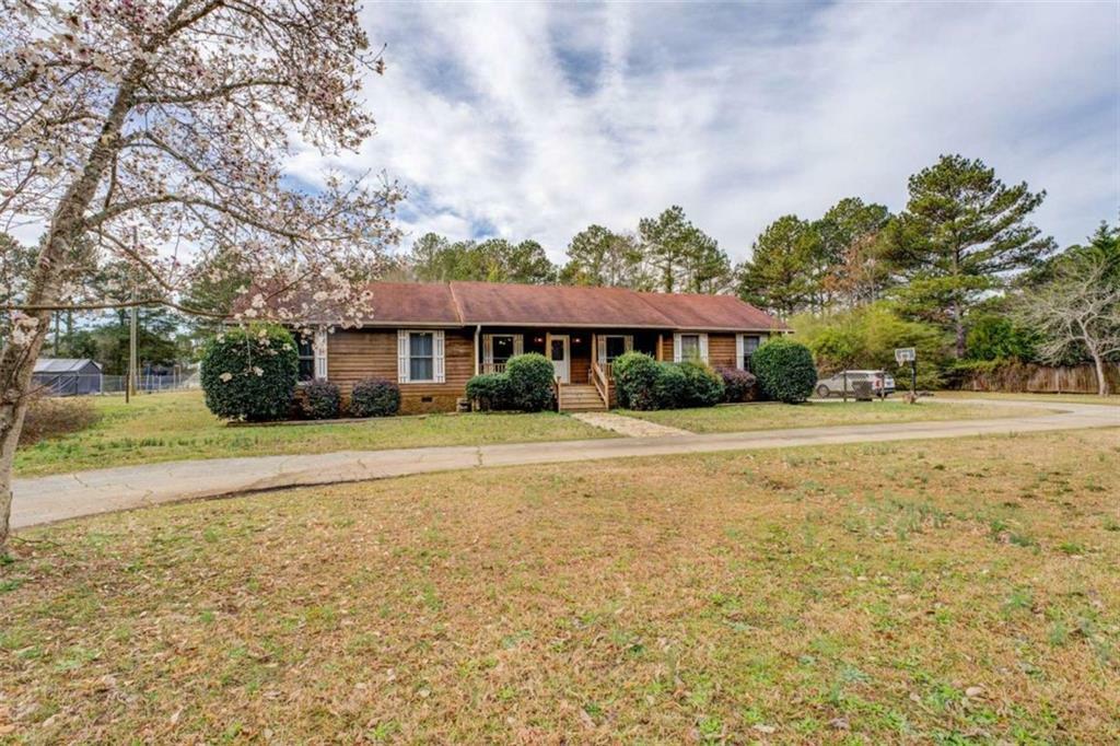 Property Photo:  5687 Highway 212  GA 30016 
