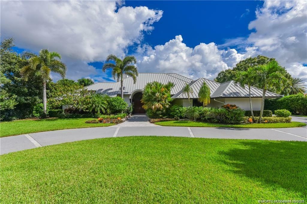 Property Photo: 5077 Inverness Court FL 34990