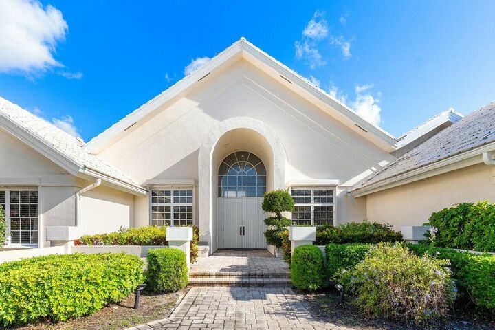 Property Photo: 4869 Tallowwood Lane FL 33487