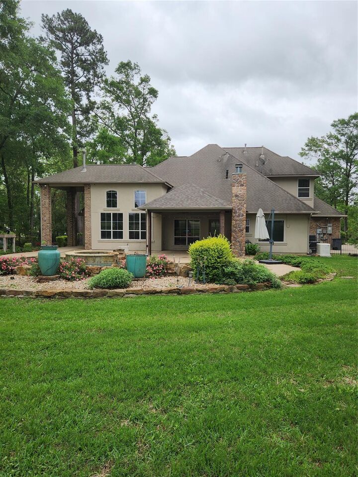 Property Photo: 5016 Rimrock Pass Drive TX 77316