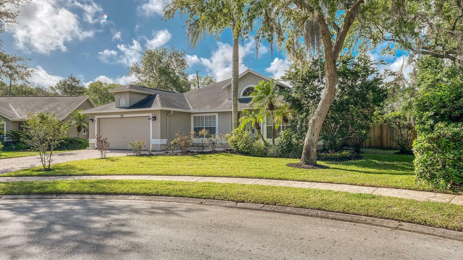 Property Photo: 203 Red Bud Court FL 32746