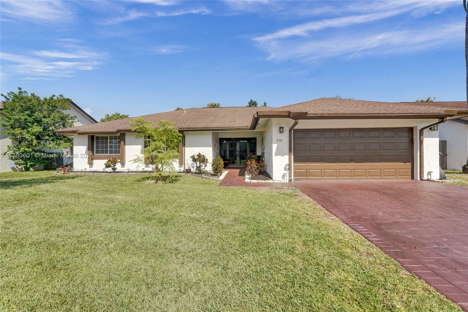 Property Photo: 731 SW 99th Ave FL 33025