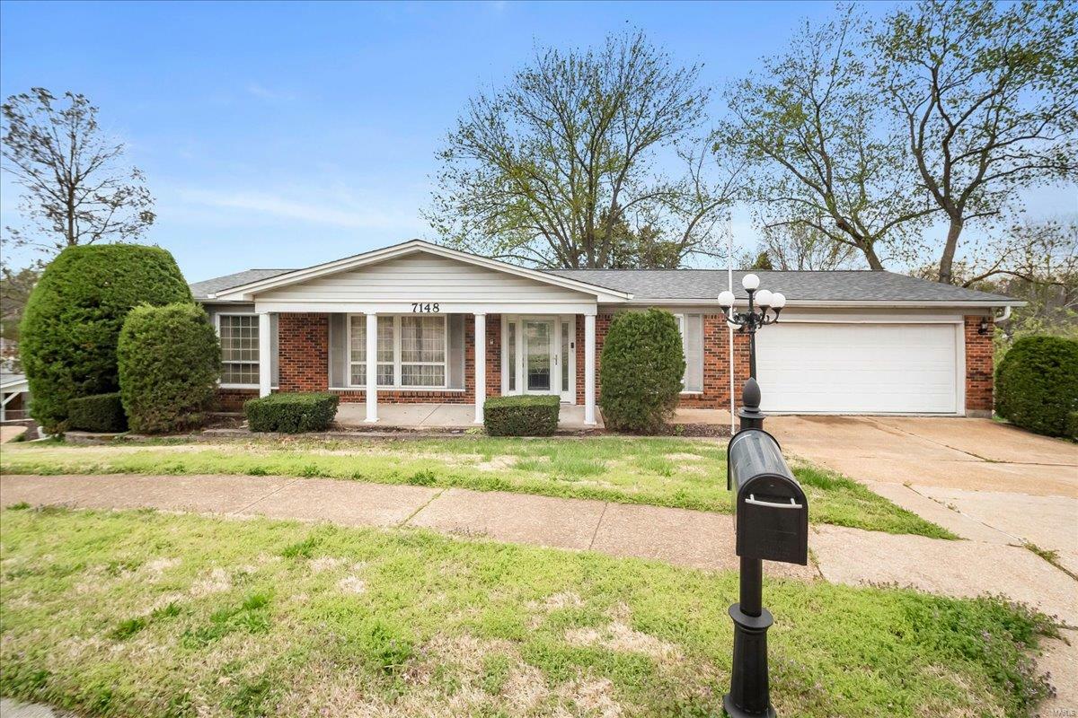 Property Photo: 7148 Hollymont Drive MO 63123