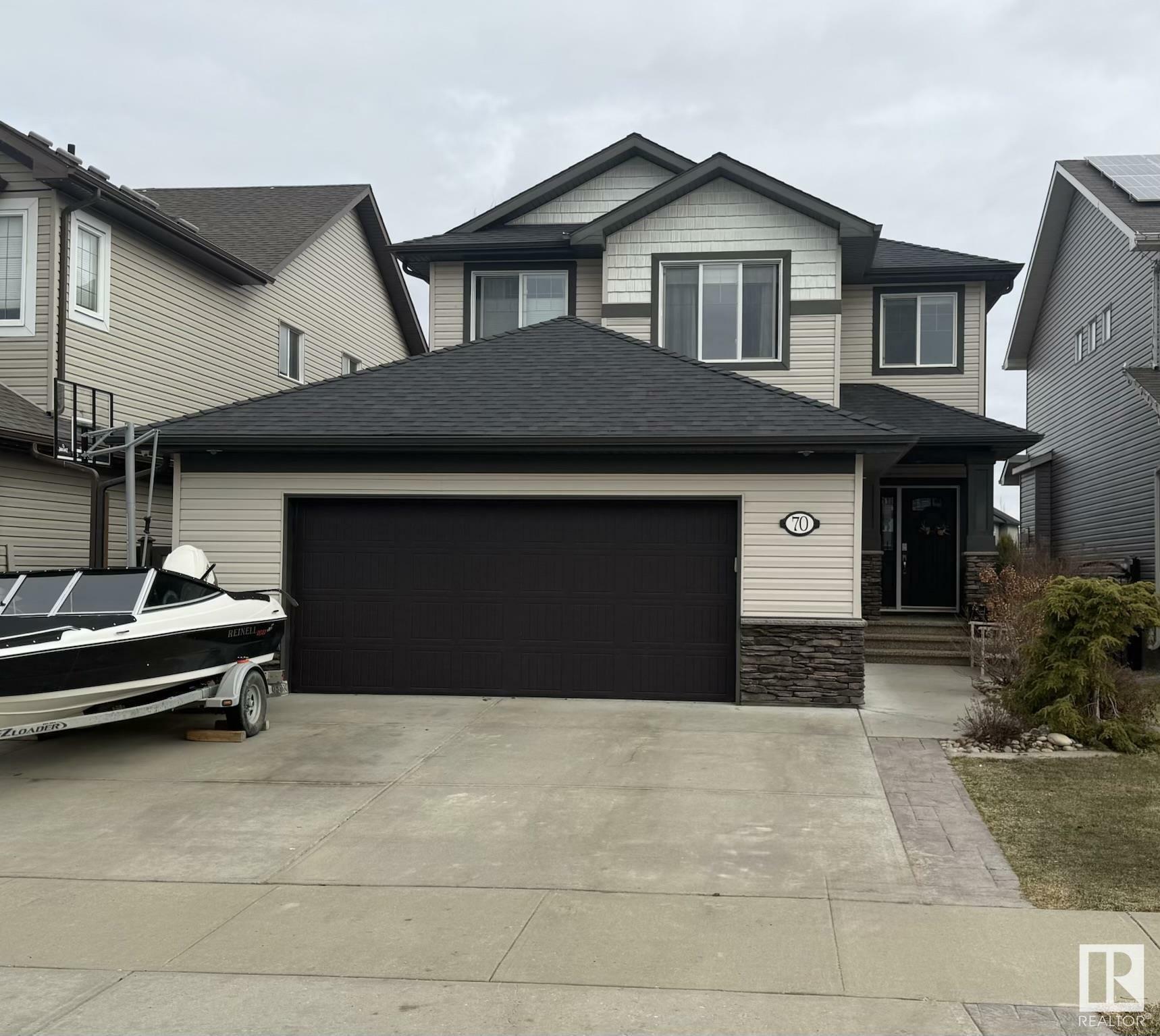 Property Photo: 70 Cranberry Bend AB T8L 0K4