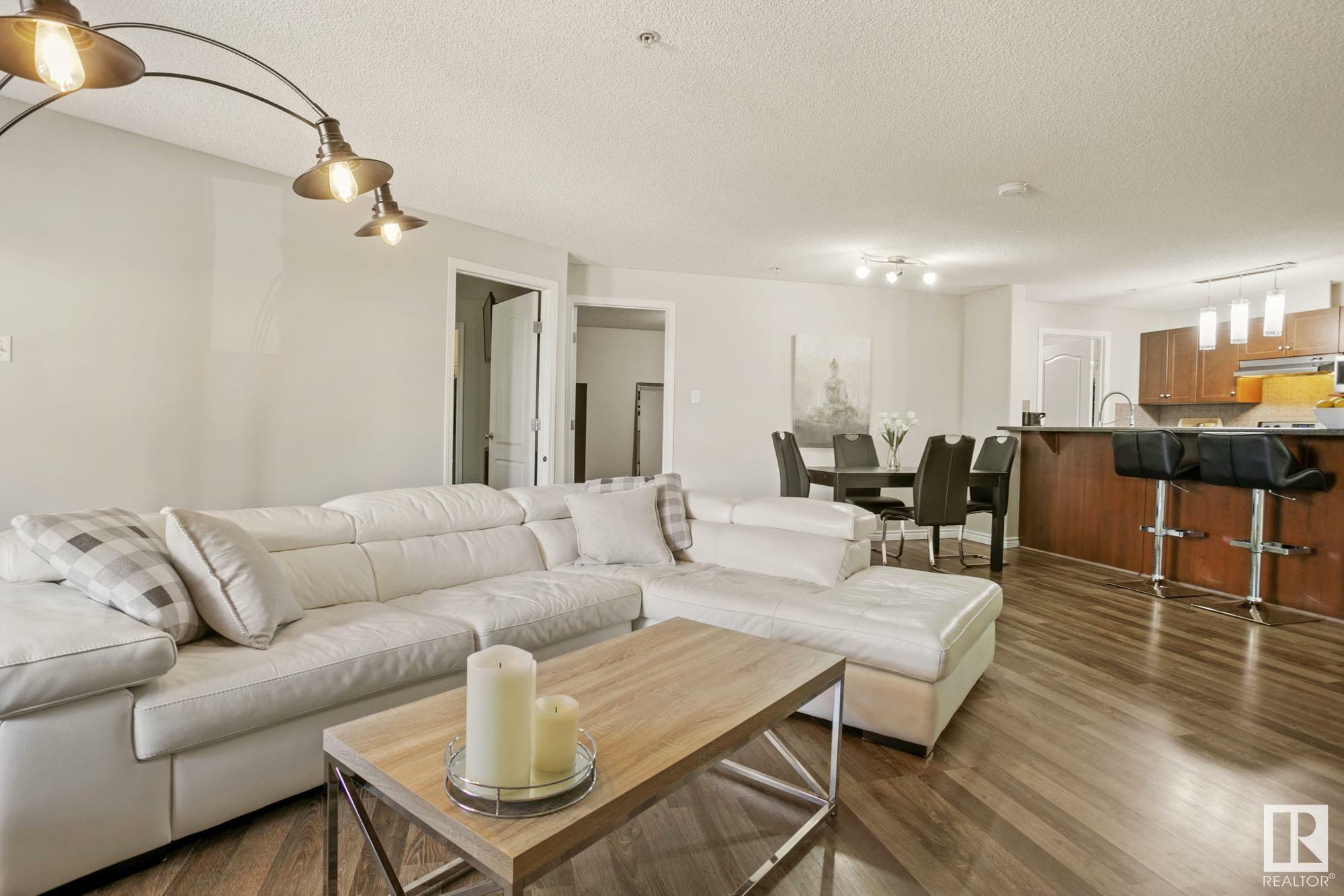 Property Photo: 9363 Simpson Drive NW 1123 AB T6R 0N2