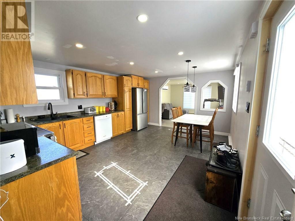 Property Photo: 28 Parc P'Tiso Street NB E3V 3X7