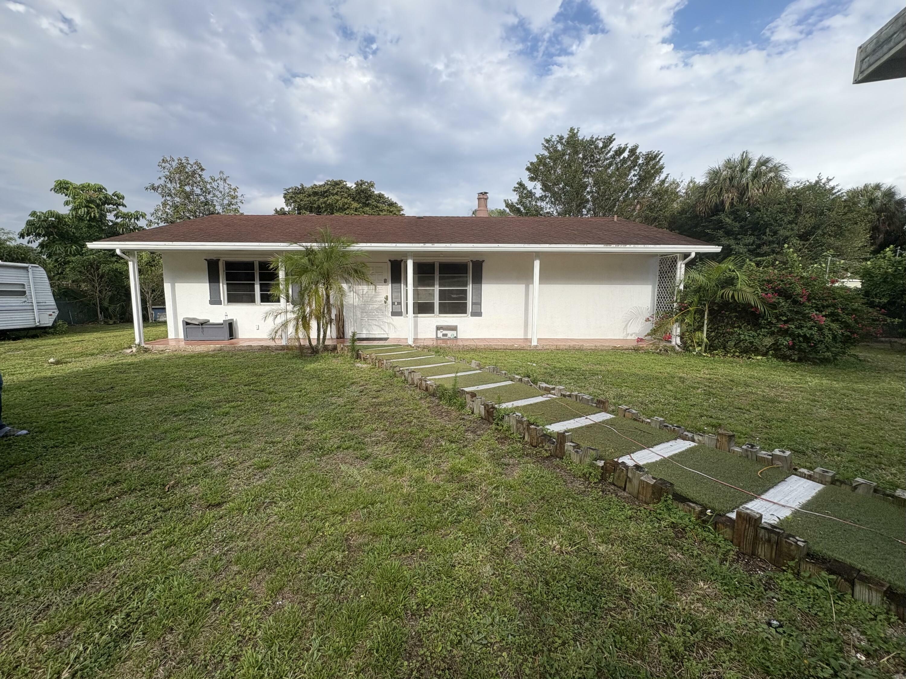 Property Photo: 350 53rd Drive N FL 33415