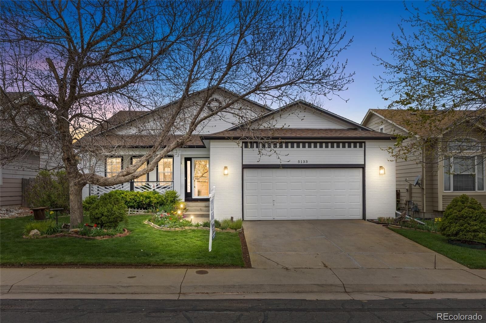 Property Photo: 5133 S Liverpool Way CO 80015