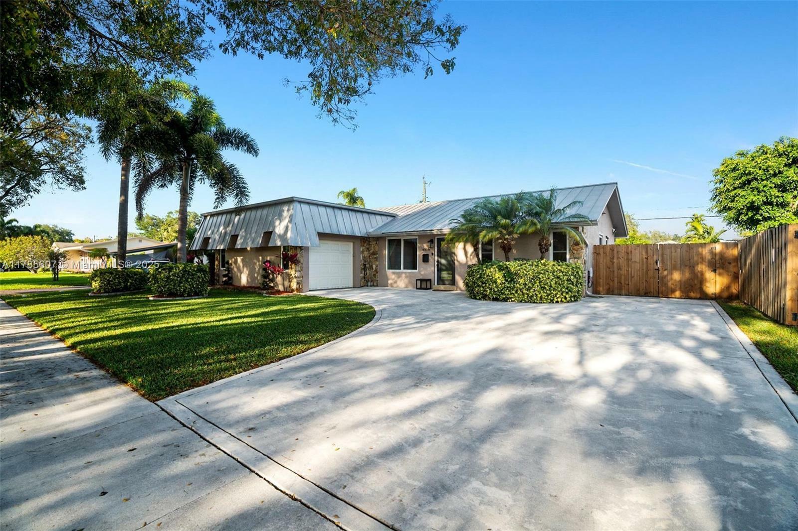 Property Photo: 4958 SW 90th Way FL 33328