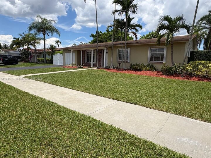 Property Photo:  12021 SW 119th St  FL 33186 