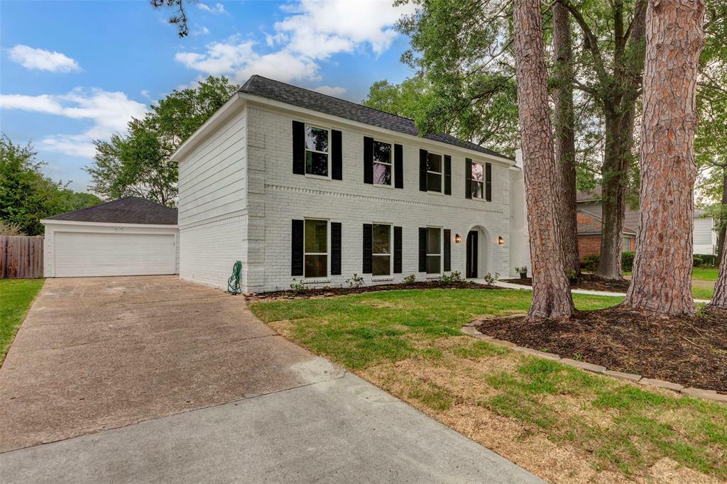 Property Photo: 7707 12th Fairway Lane TX 77346