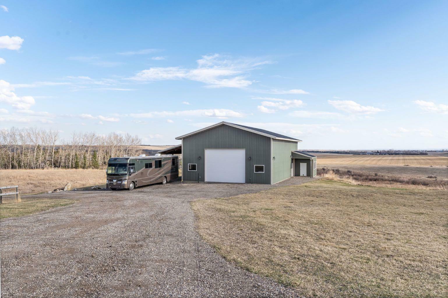 Property Photo: 306043 92 Street E 100 AB T1S 3Y5