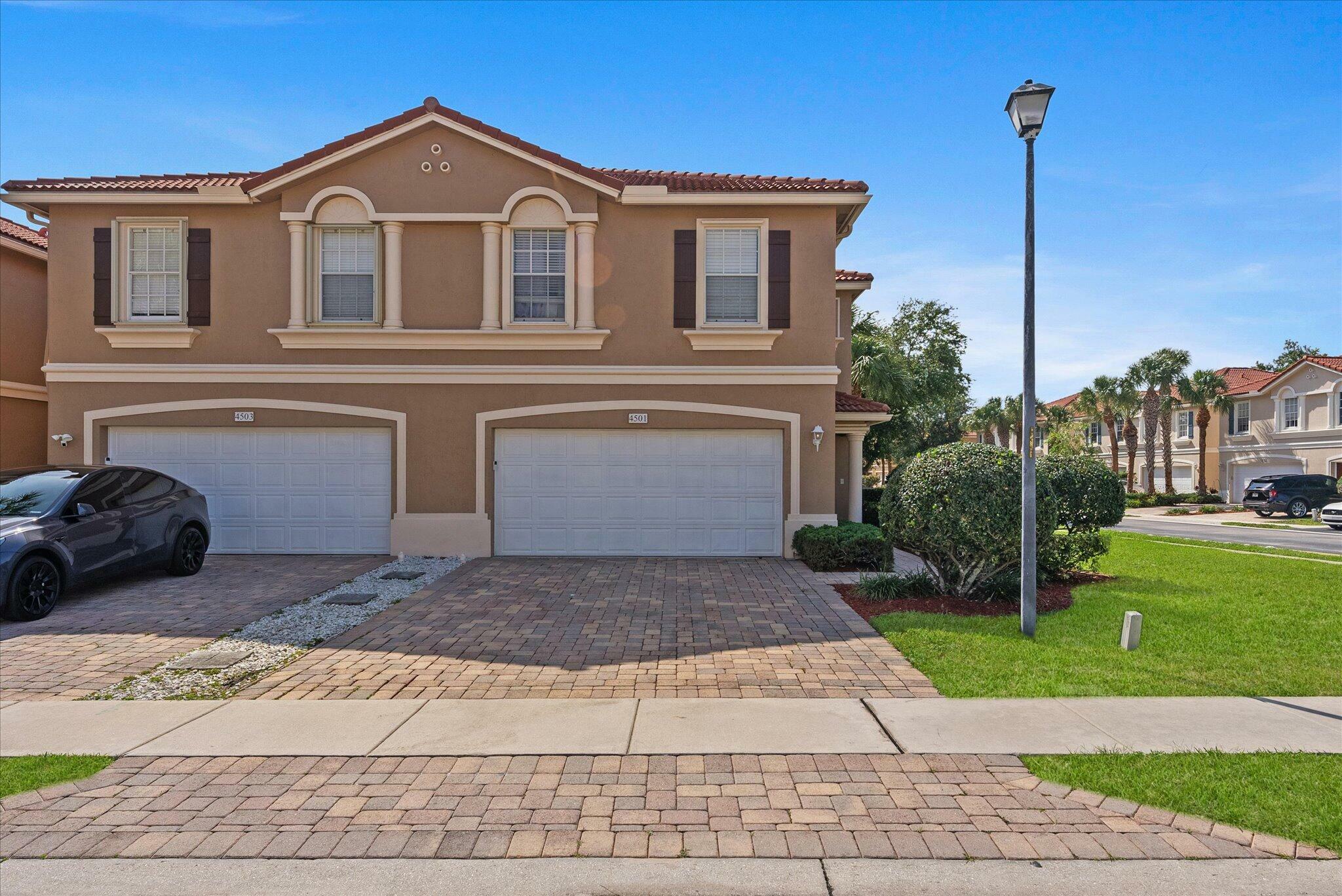 Property Photo: 4501 Cohune Palm Court FL 33463