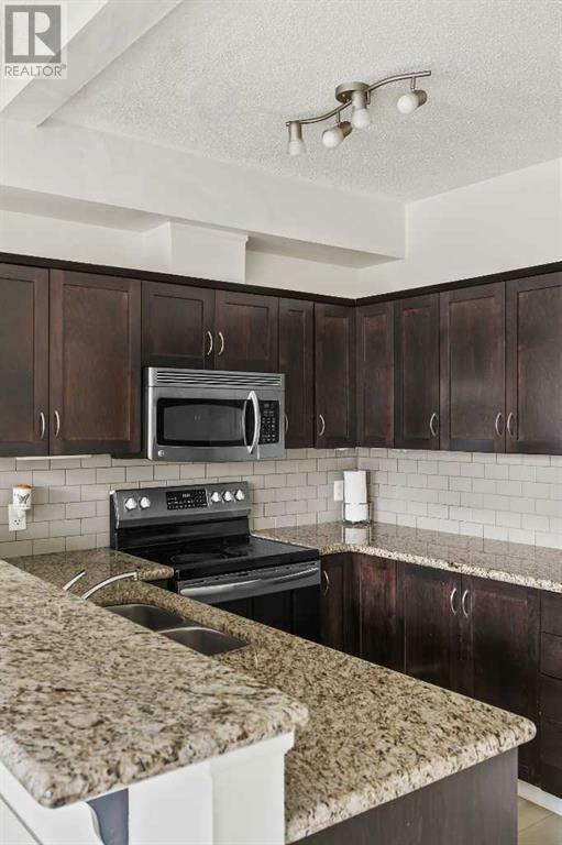 Property Photo: 211 Aspen Stone Boulevard Southwest AB T3H 0K1