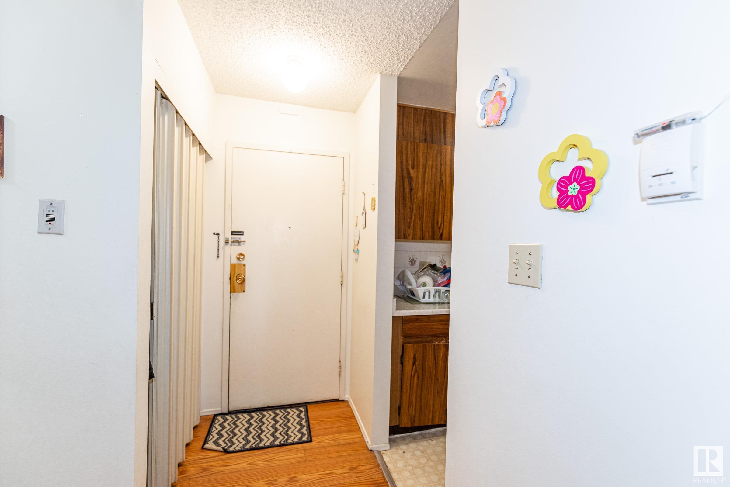 Property Photo: 11265 31 Avenue NW 77 AB T6J 3V7