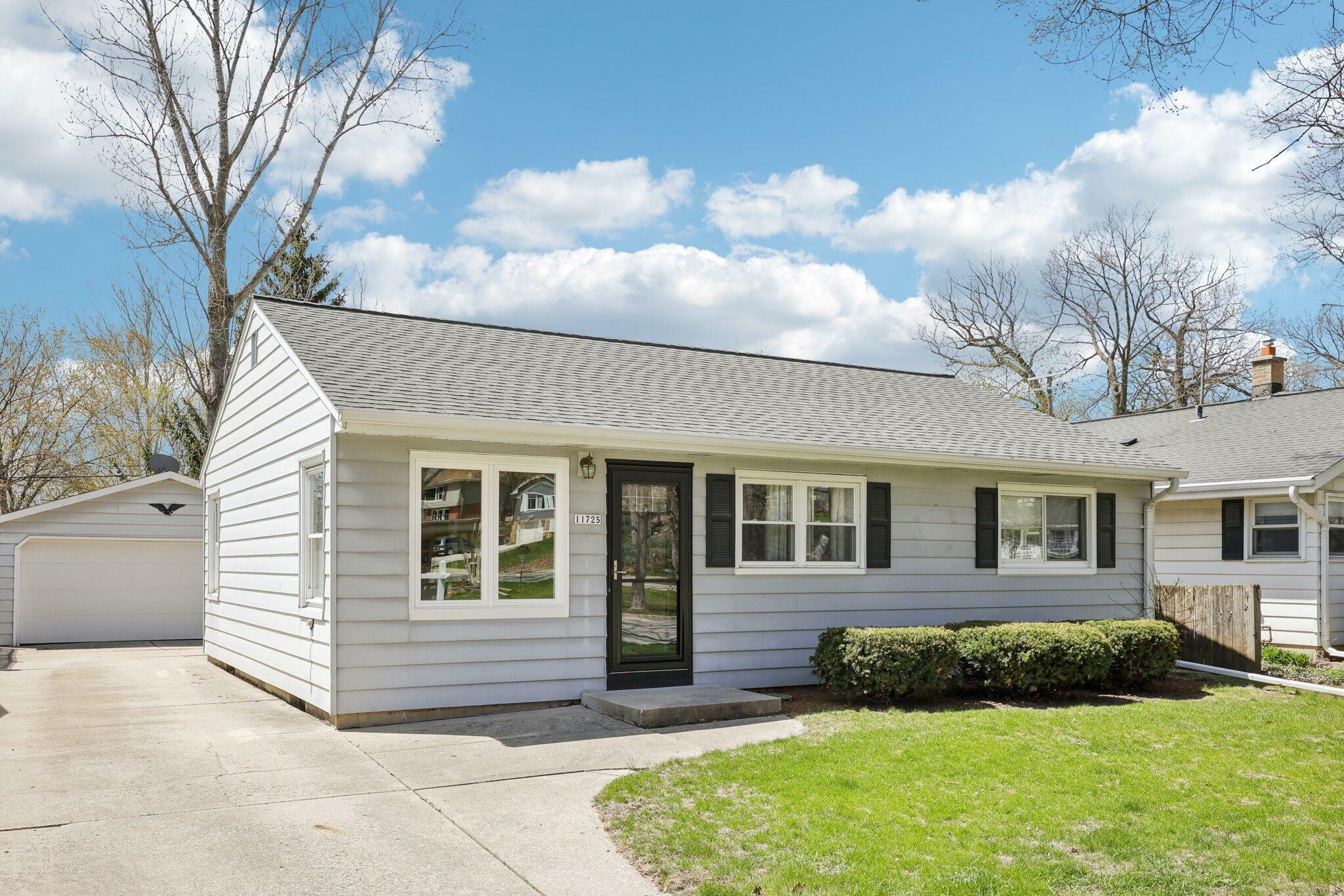 Property Photo: 11725 W Oxford Pl WI 53226