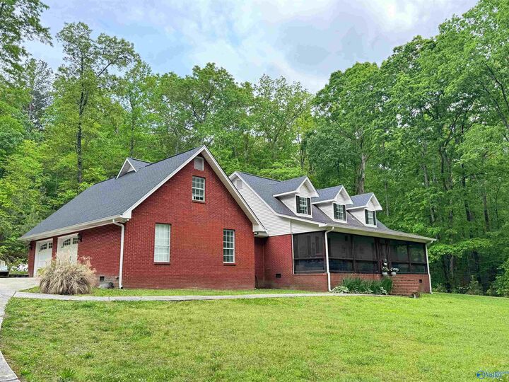 Property Photo: 7668 Owls Hollow Road AL 35901