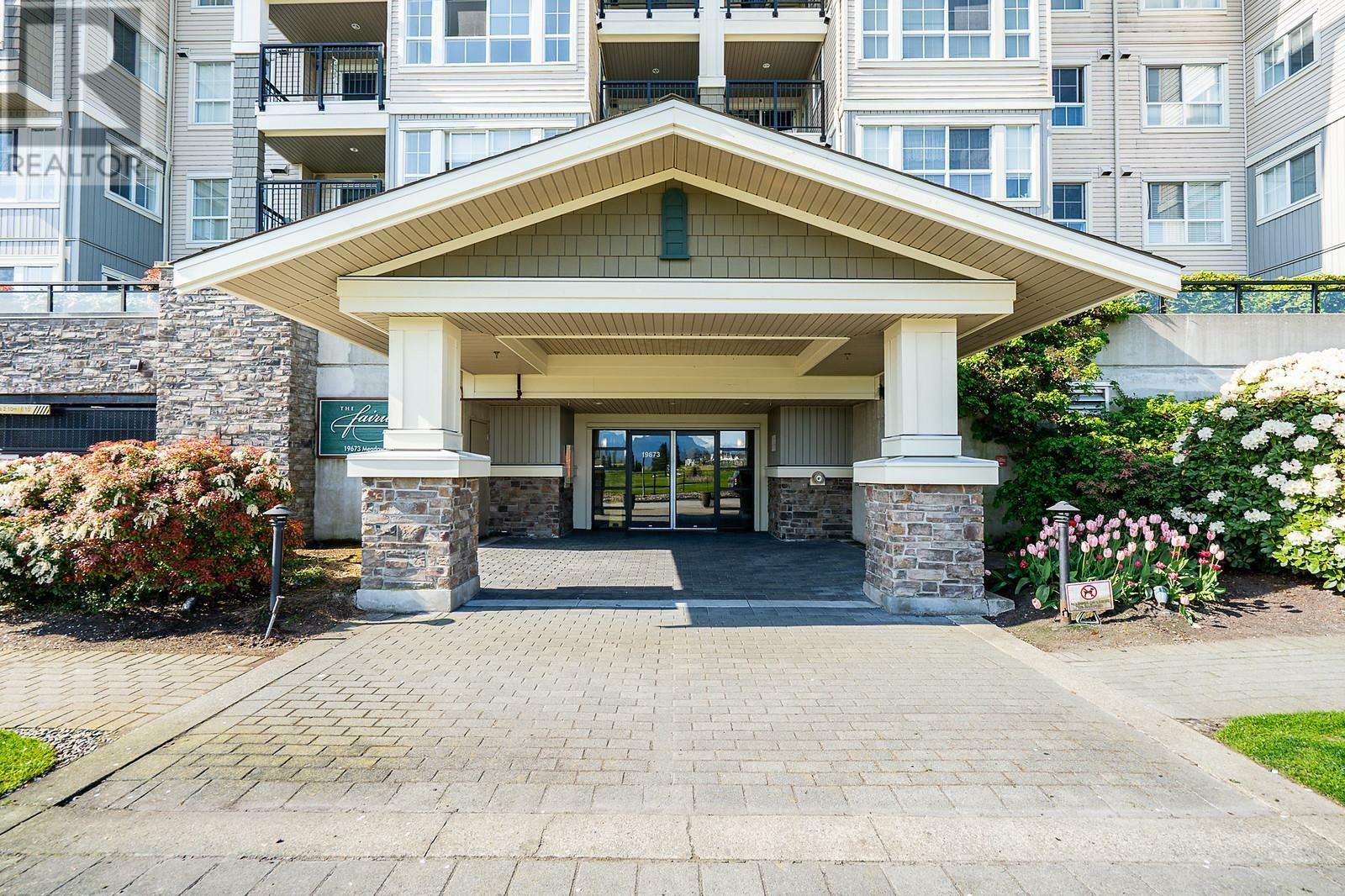 Property Photo: 19673 Meadow Gardens Way 123 BC V3Y 0A1