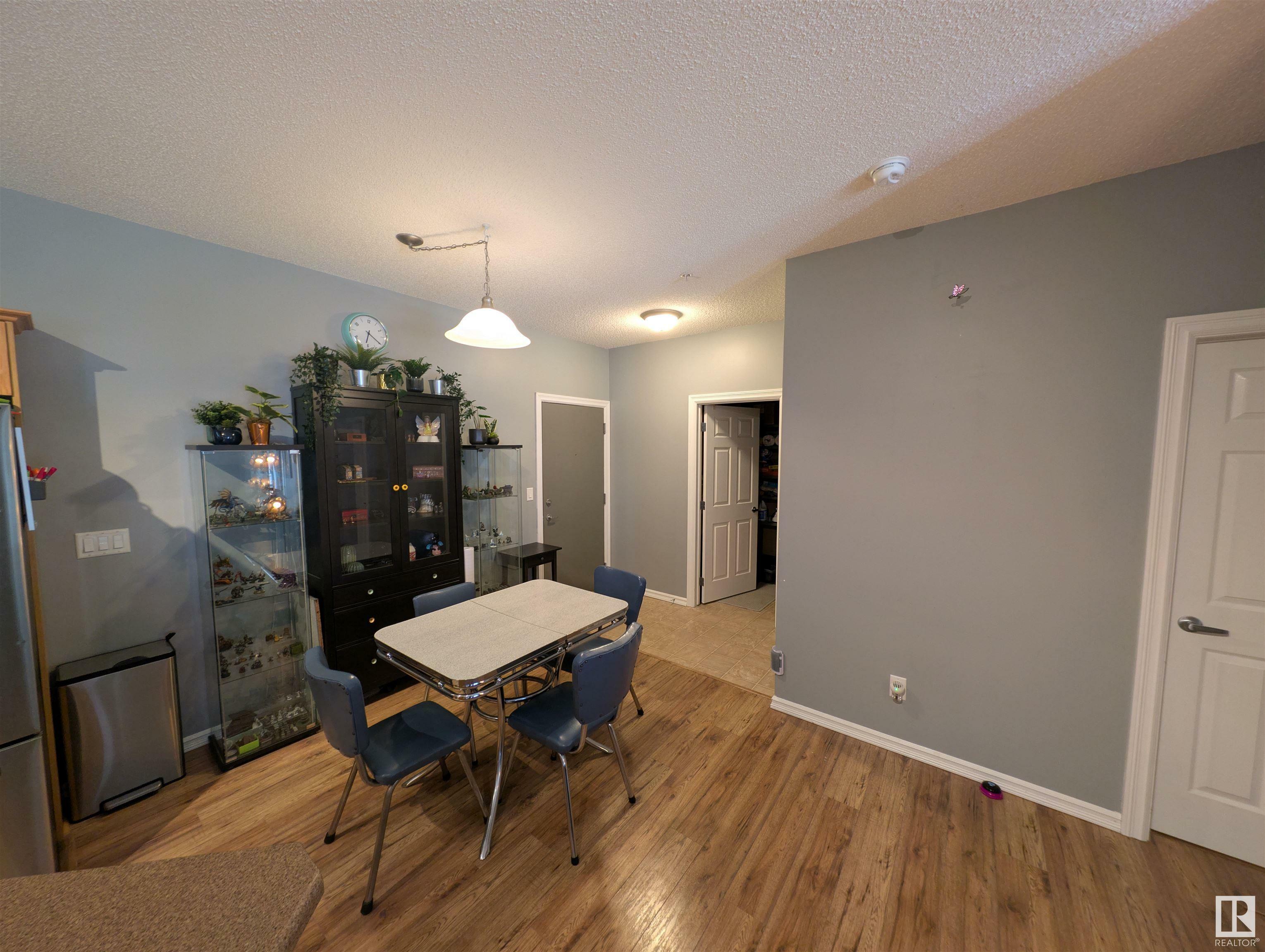 Property Photo: 226 Macewan Road SW 208 AB T6W 0C5
