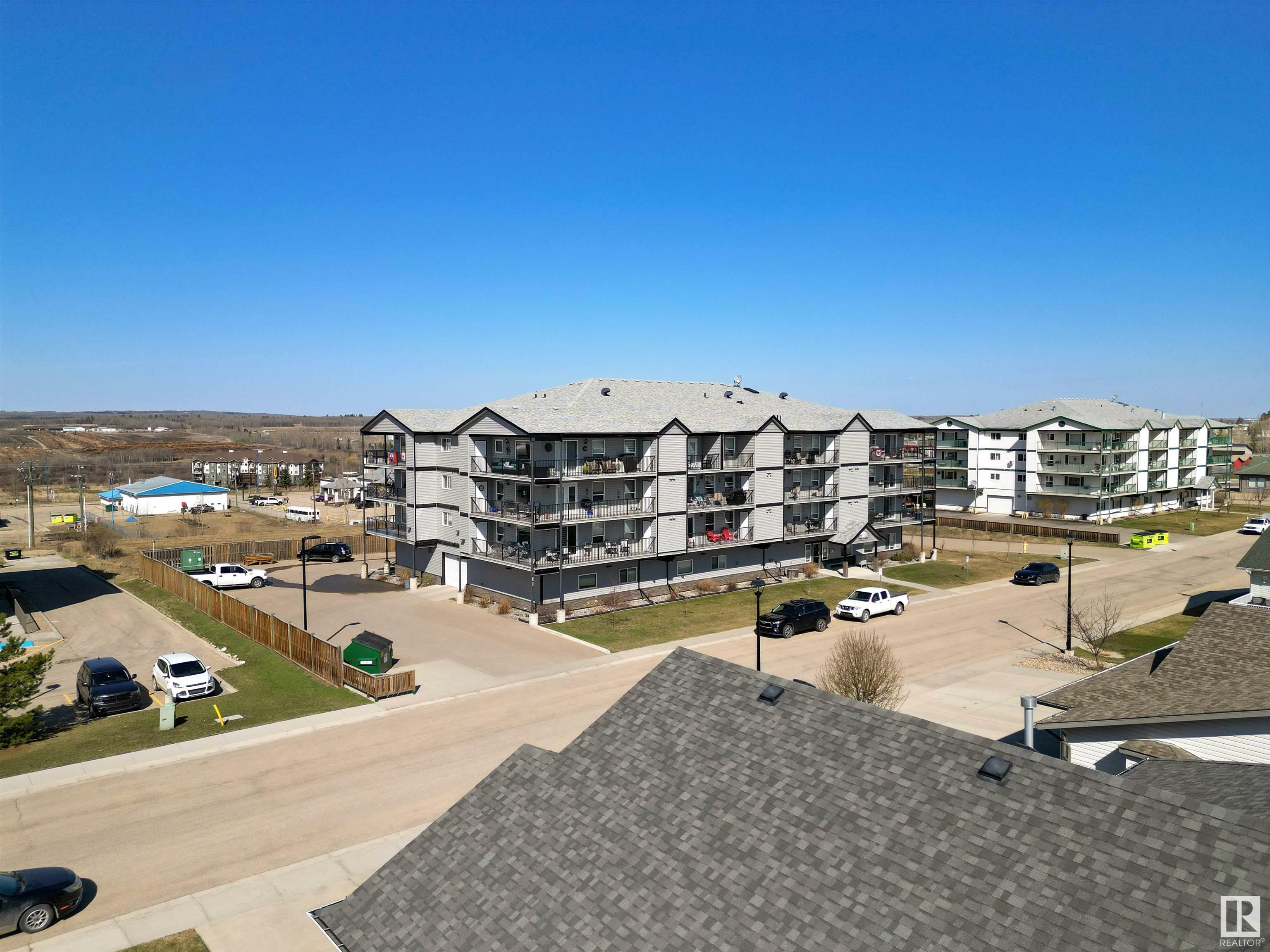 Property Photo: 4002 47 Street 202 AB T7A 0A2