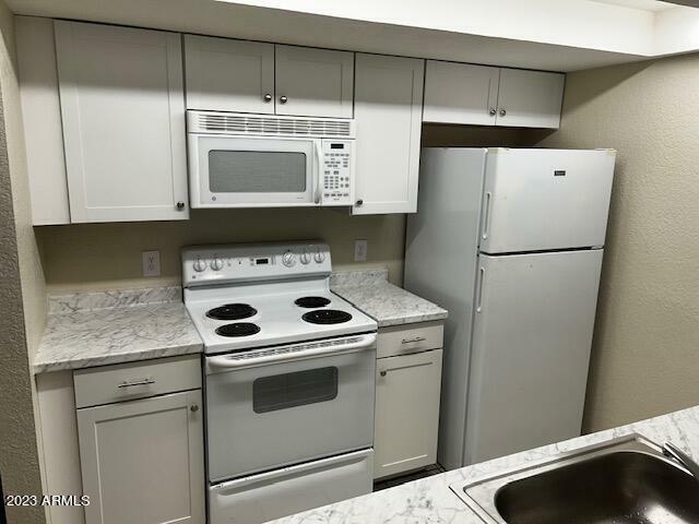 Property Photo: 1444 N Recker Road 156 AZ 85205