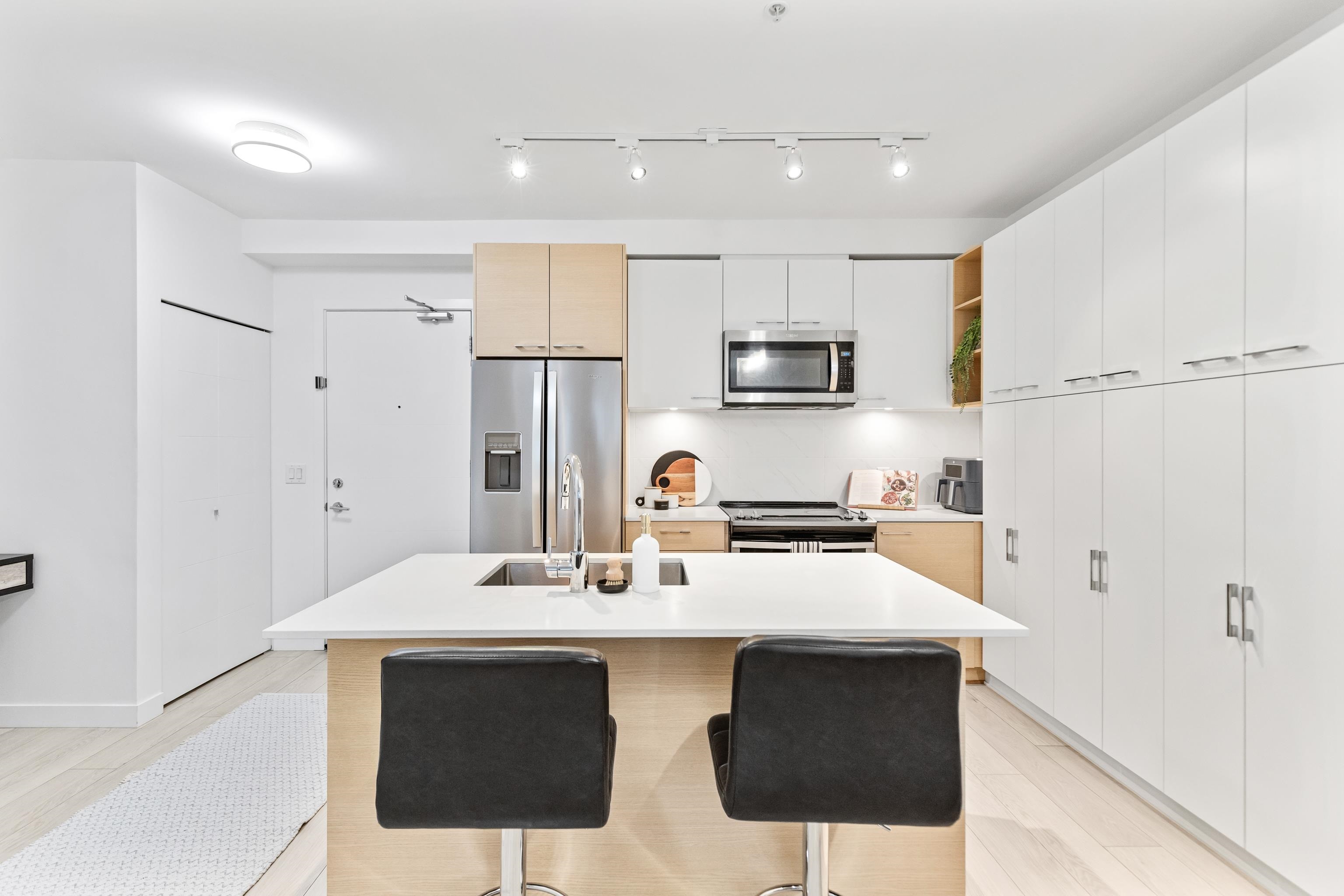 Property Photo: 13963 105 Boulevard 311 BC V3T 0M9