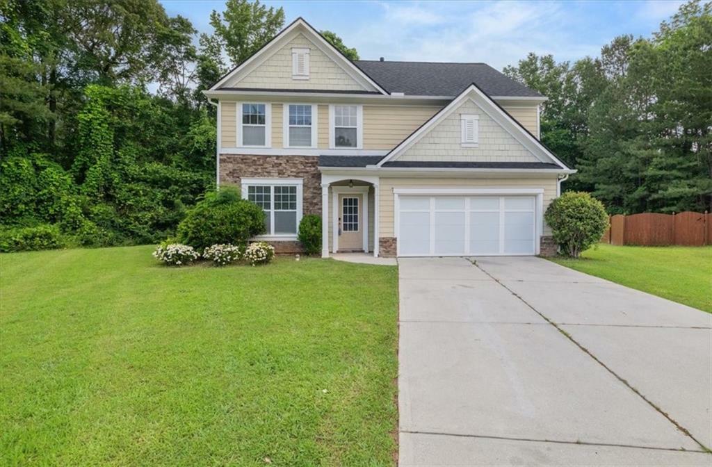 Property Photo: 145 Redsage Ridge GA 30349