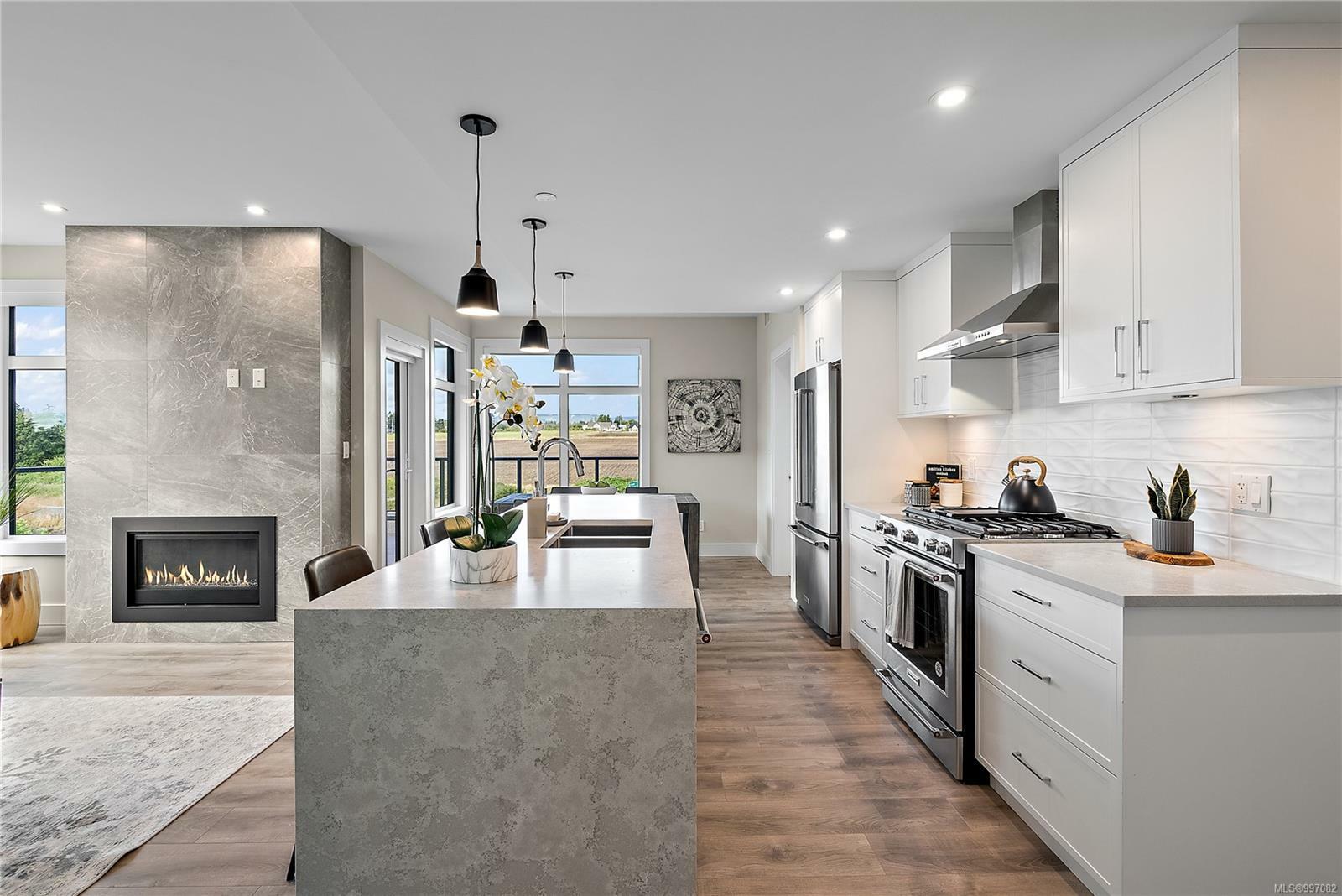 Property Photo: 2520 Hackett Cres 309 BC V8M 0B9