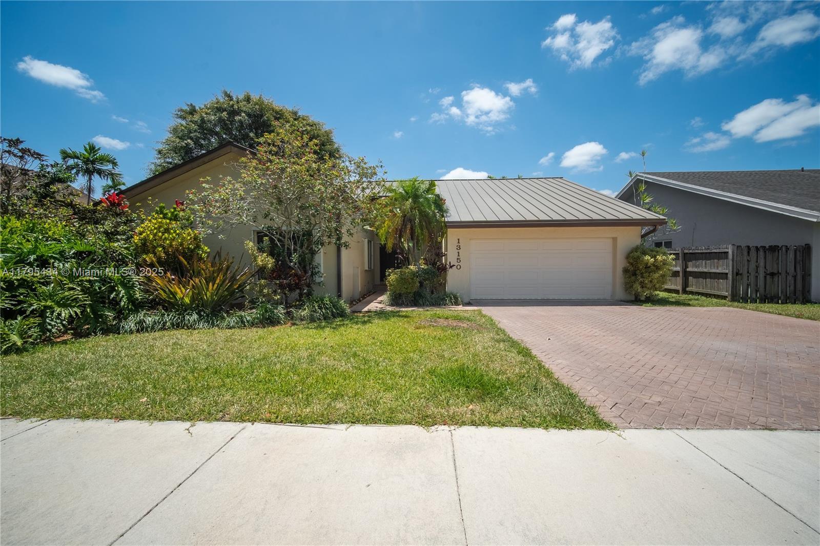 Property Photo:  13150 SW 106th St  FL 33186 