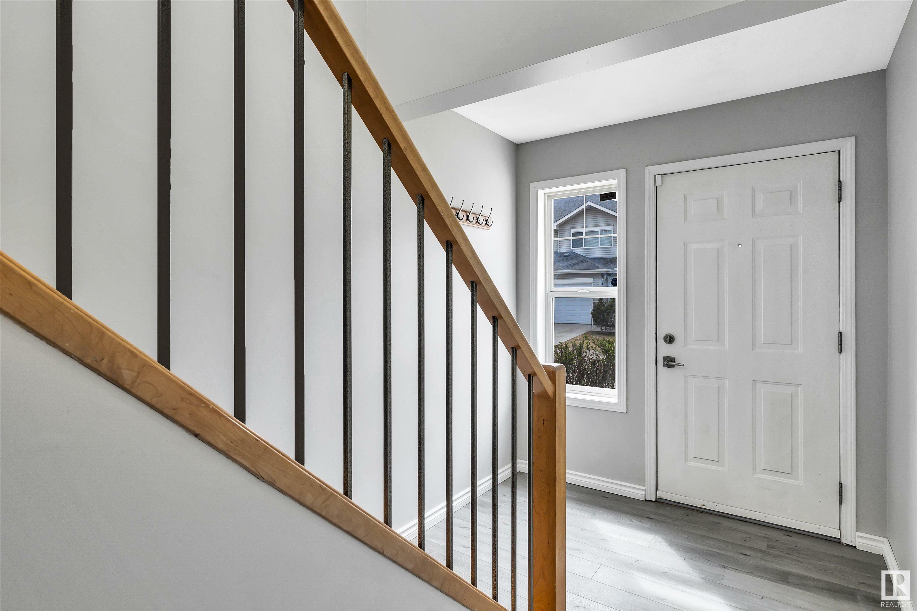 Property Photo: 230 Edwards Drive SW 100 AB T6X 1G7