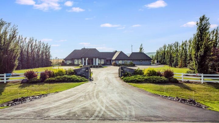 Property Photo: 338025 40 Street W AB T1S 7B5