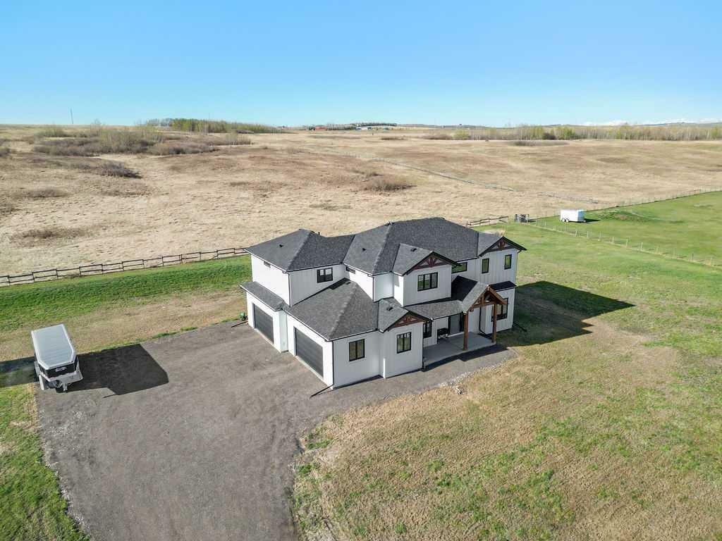 Property Photo: 378035 Tiki Ranch Place W AB T1S 1A1