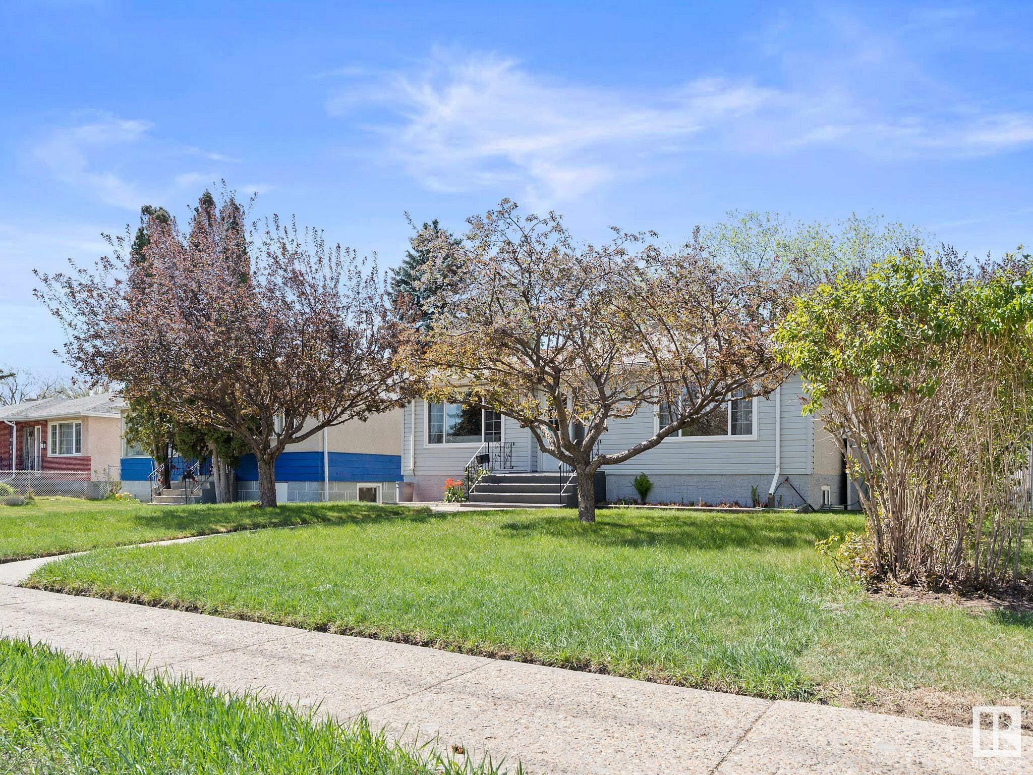 Property Photo: 11930 50 Street NW AB T5W 3C2