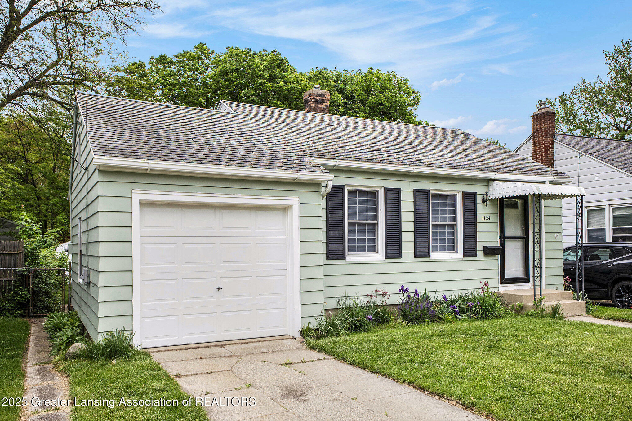 Property Photo: 1124 Poxson Avenue MI 48910