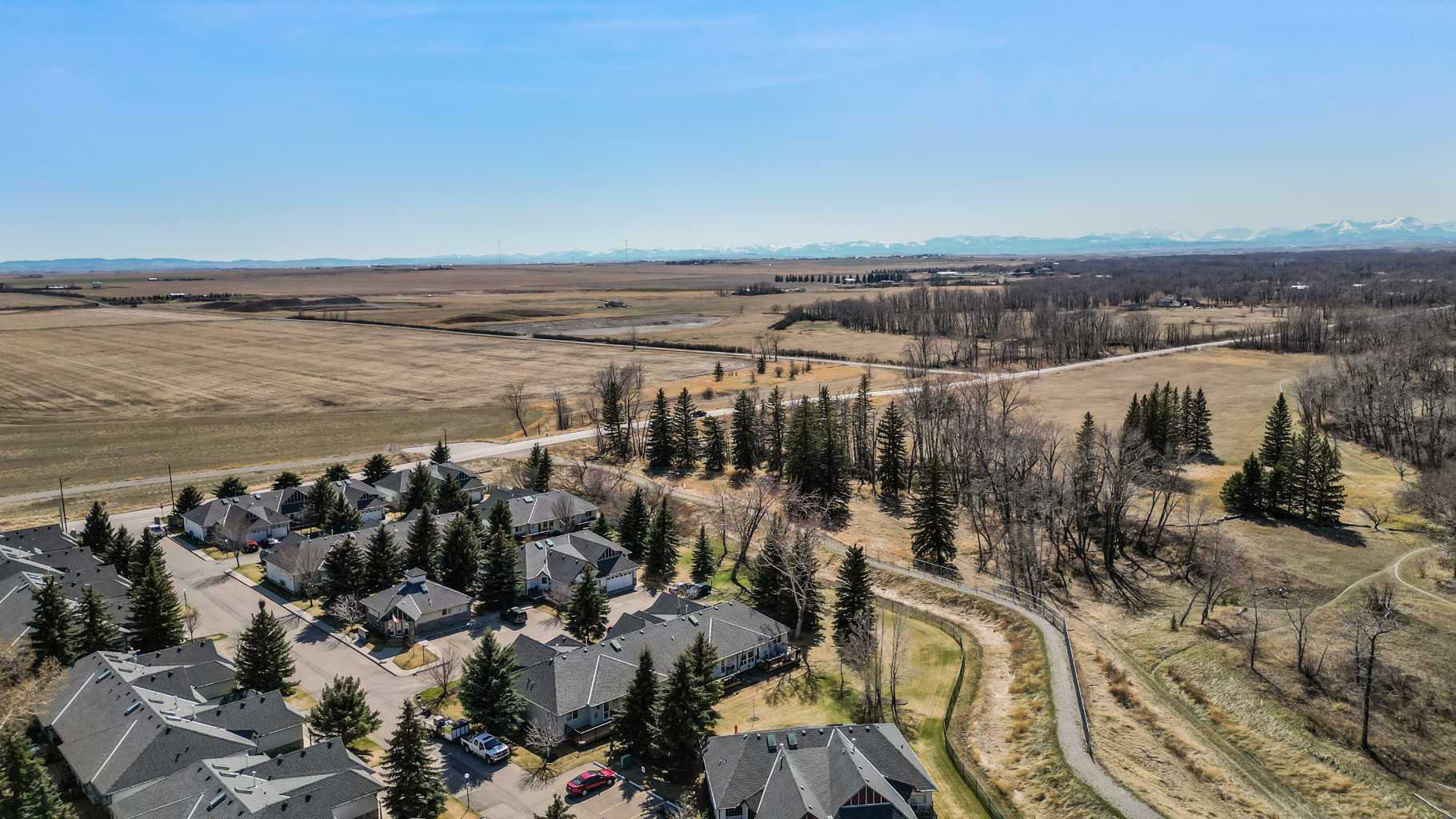 Property Photo: 305 Baker Creek Rise SW AB T1V 1V7