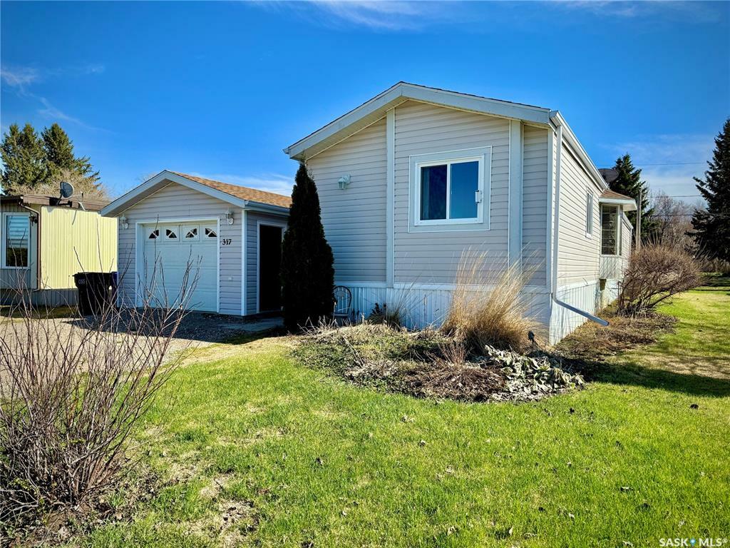 Property Photo: 317 Riedel Avenue E SK S0A 2A0