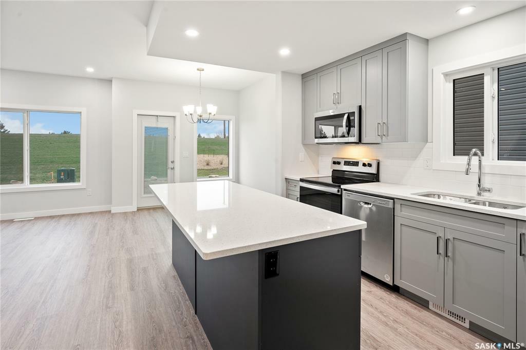 Property Photo: 210 Antonini Court SK S7L 7P3