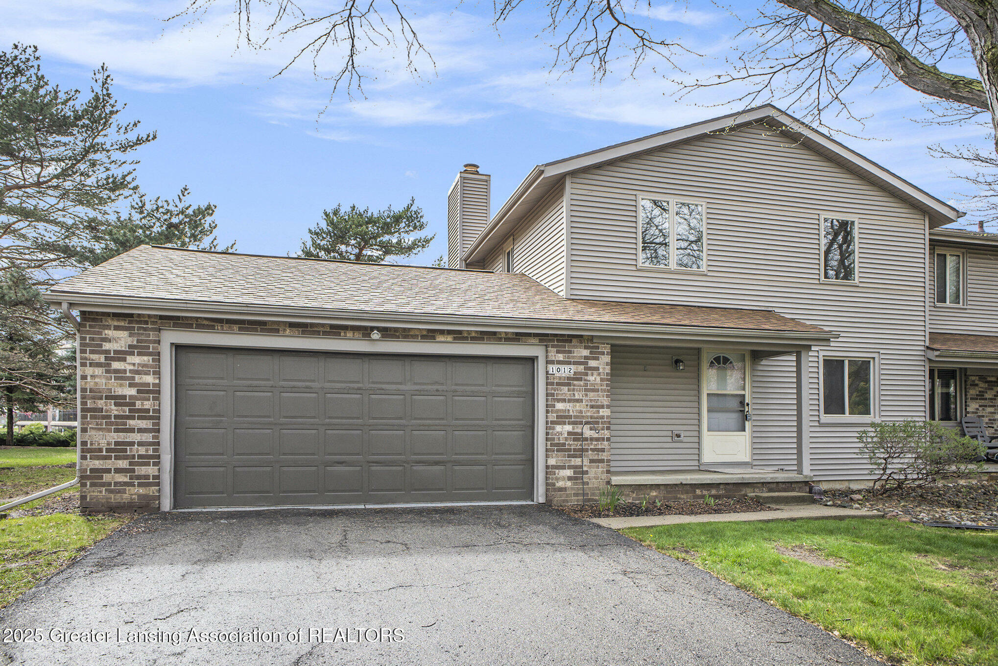 Property Photo: 1012 Grenoble Circle MI 48917