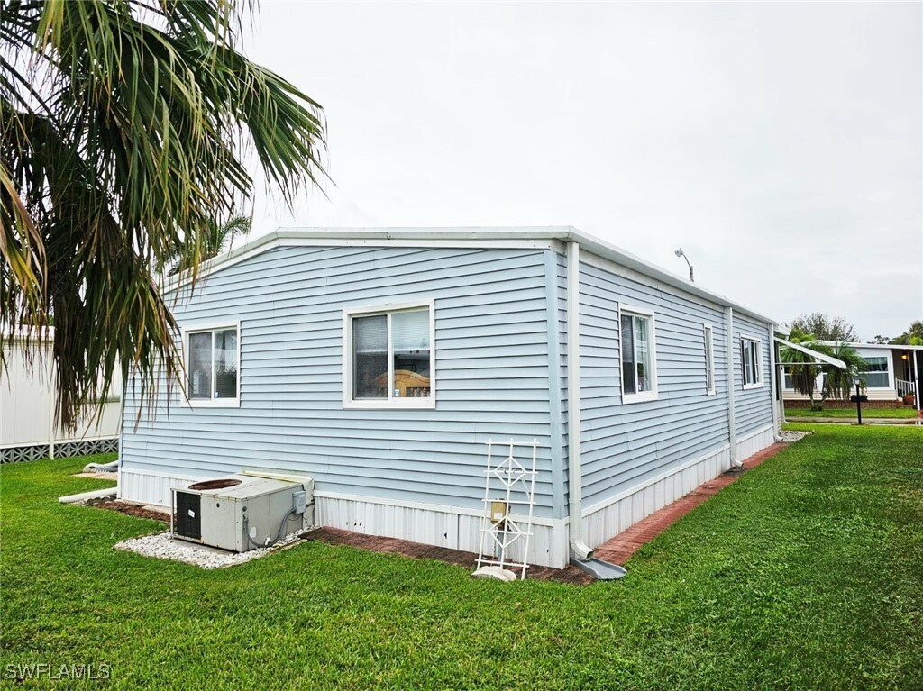 Property Photo: 102 Poinsettia Drive FL 33905