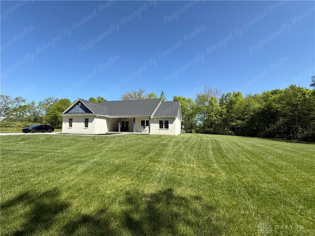 Property Photo: 8219 Wind Dancer Drive OH 45327
