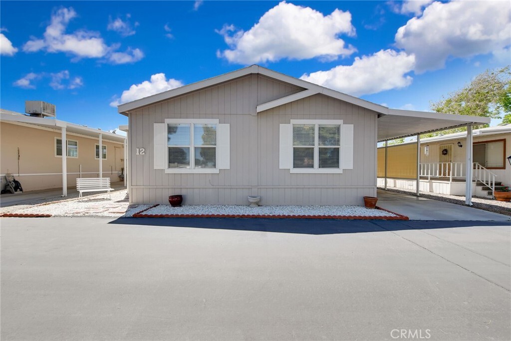Property Photo: 14000 El Evado Road 12 CA 92392