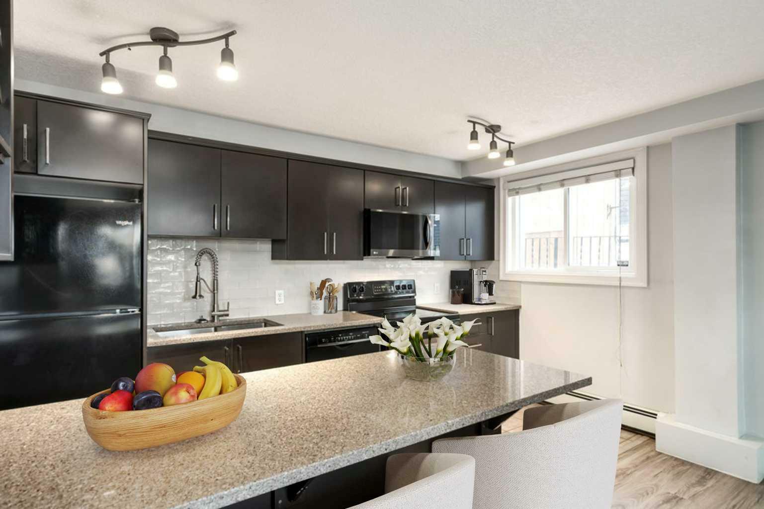 Property Photo: 835 18 Avenue SW 105 AB T2T 0G9