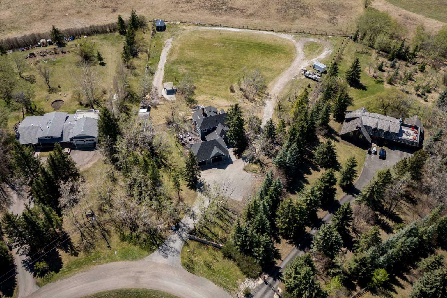 Property Photo: 48101 244 Avenue W AB T1S 4C5